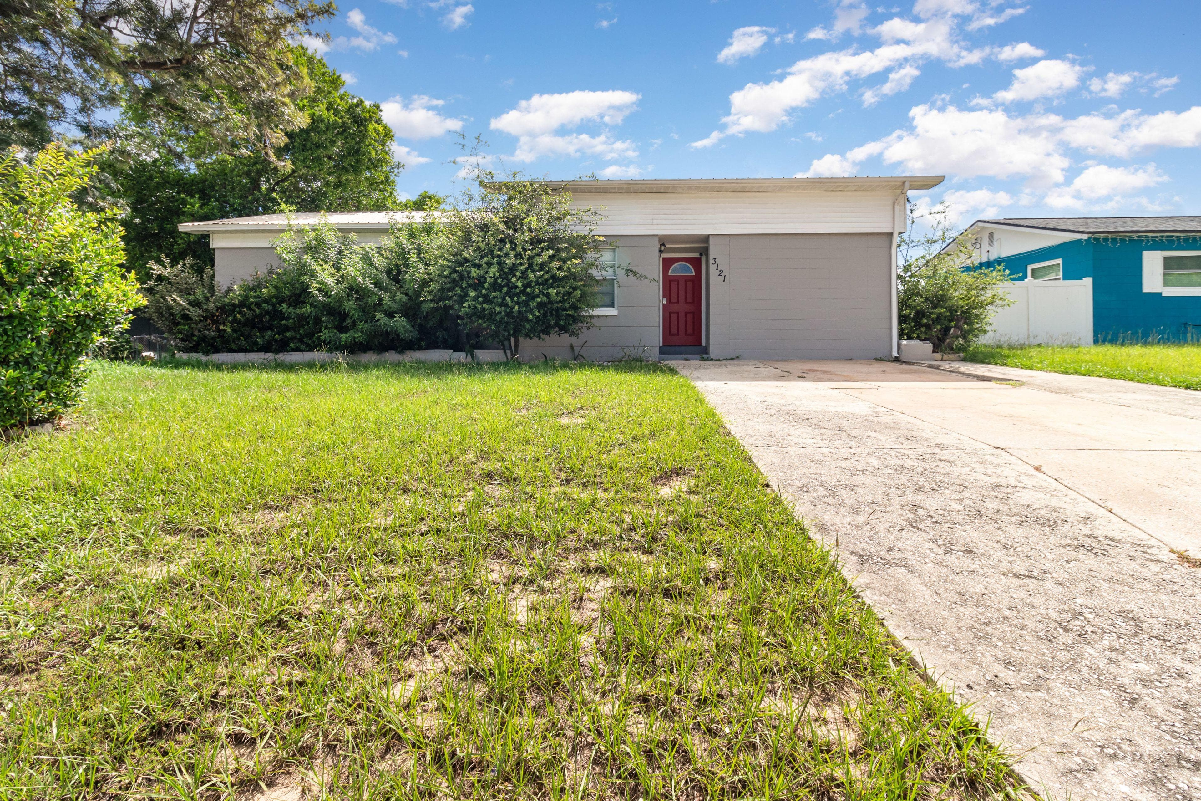 Welcome to your future home! This charming exterior showcases a well-maintained property with a welcoming entrance, ample parking, and lovely greenery—perfect for enjoying peaceful evenings or weekend gatherings. Imagine coming home to this inviting space every day!