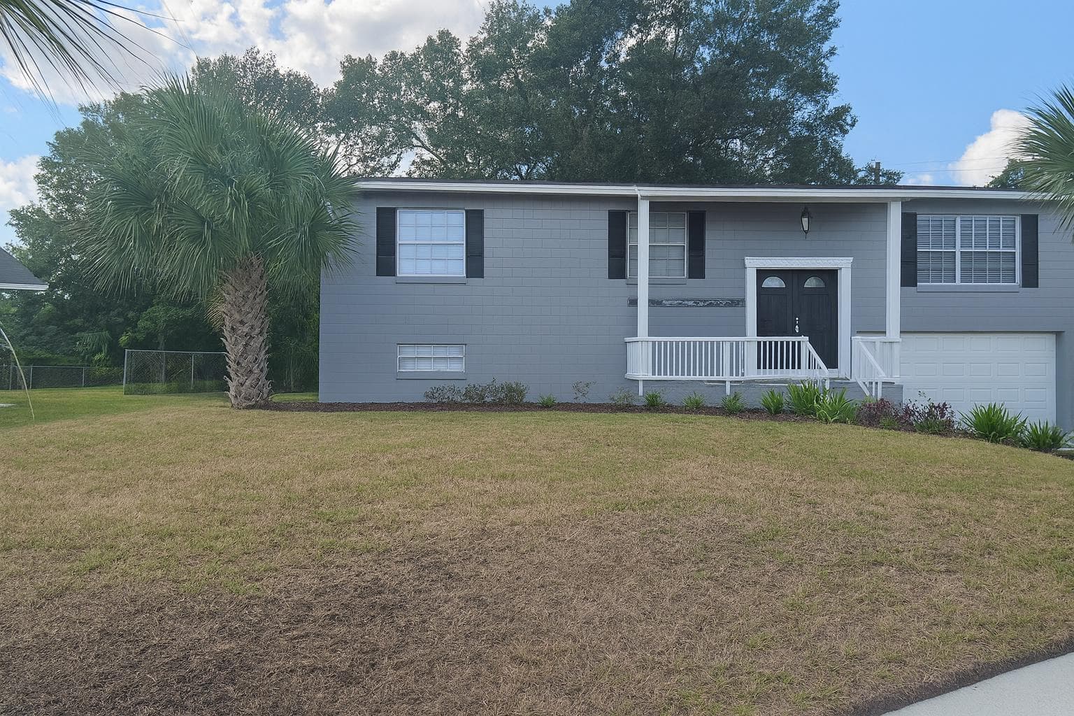Welcome to your future home! This charming exterior features a well-maintained front yard and inviting entrance, perfect for those seeking a serene living environment. The tasteful gray siding and white accents create a modern yet cozy curb appeal. Imagine coming home to this delightful sight!