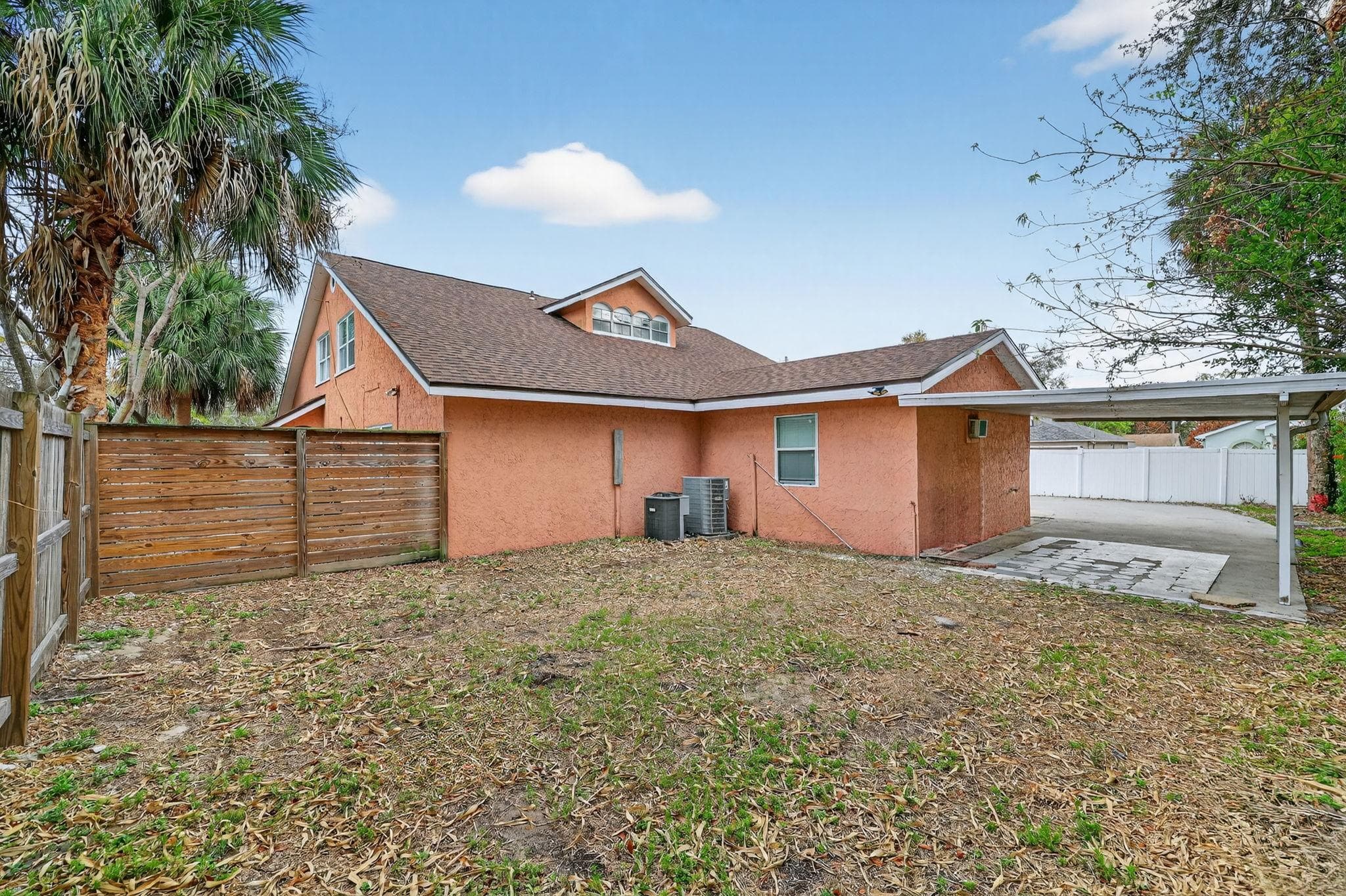 Step into the charm of this inviting exterior space, surrounded by lush greenery and a privacy fence. This cozy backyard offers a perfect area for relaxation or social gatherings, making it a great extension of your living space. Imagine enjoying a peaceful afternoon in your own outdoor retreat!